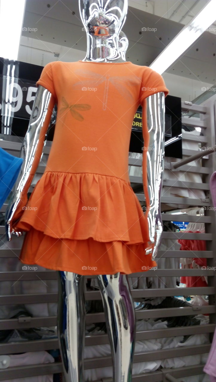 Child's dress being sold in the market