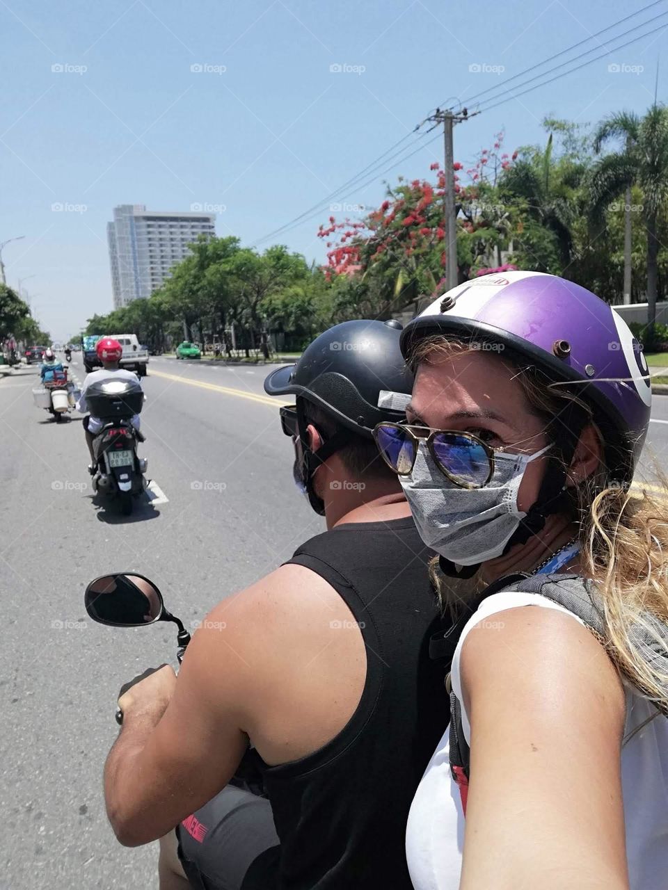 Couple riding a motorcycle