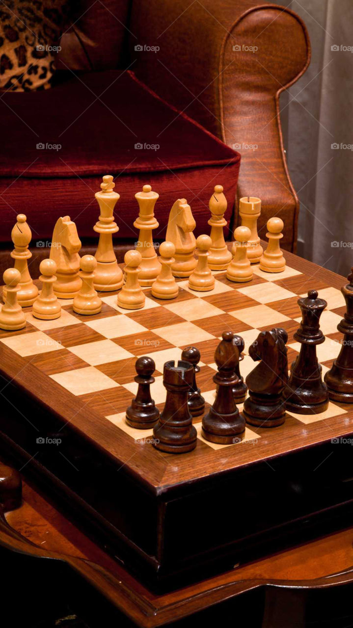 The wooden chess game is in an awesome and strategic competition and it includes a queen and many soldiers