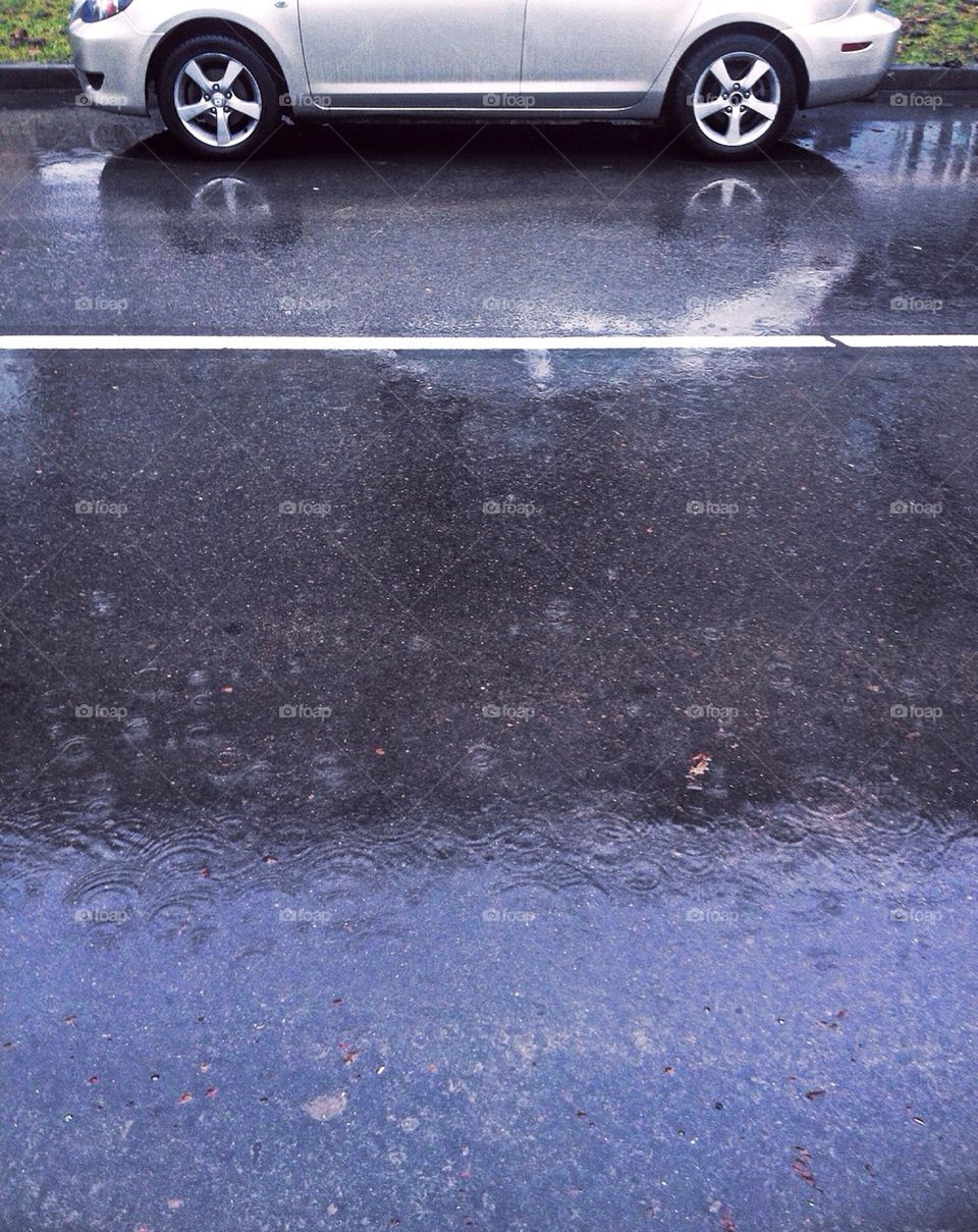 Parked car on wet road