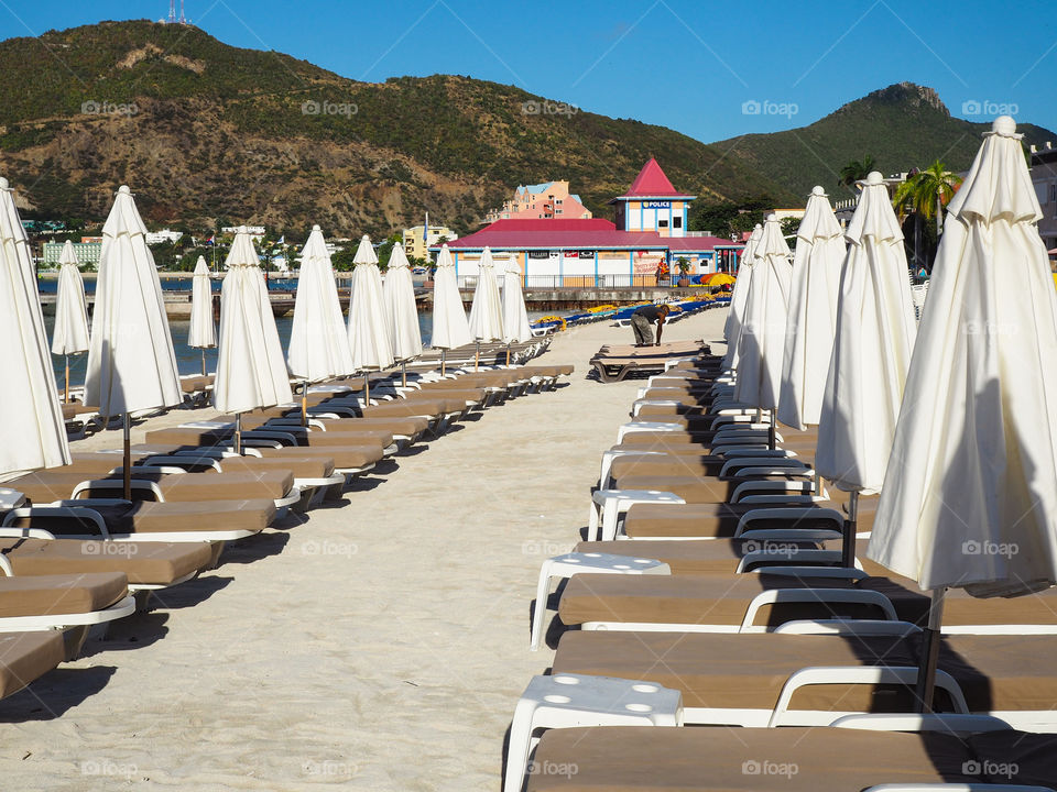 Rows of sunbeds. 