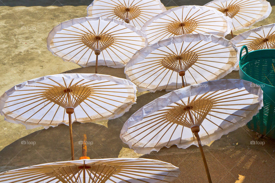 white paper thailand umbrella by sonchai