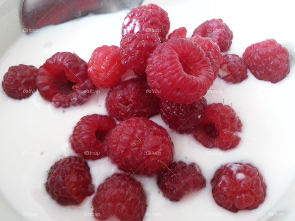Raspberry in yogurt