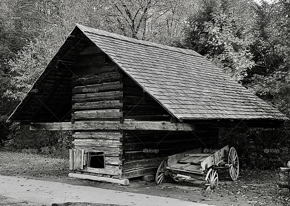 Color vs Black and White By Foap Missions  - Rural shelter and a old wagon with a broken wheel