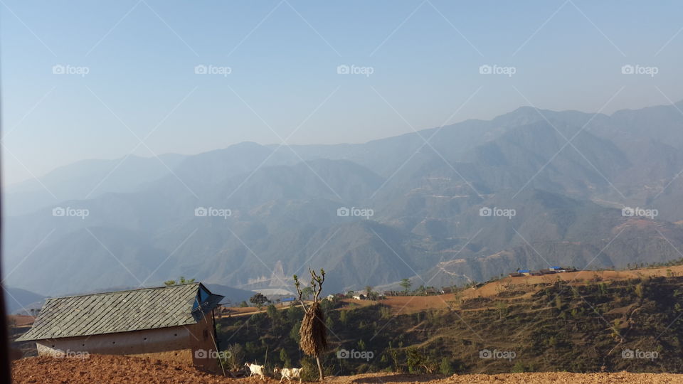 Life in a hilly region in Nepal . How life moves? We are unable even to see how people lives in this type of mountain range locations in Nepal near Kathmandu, this awesome scenery describe you all about it's life. A very beautiful place but poor people there due to politics of Nepal.