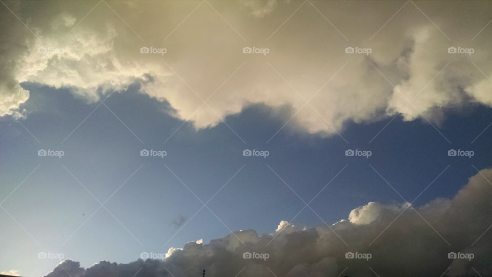 parallel clouds with blue sky