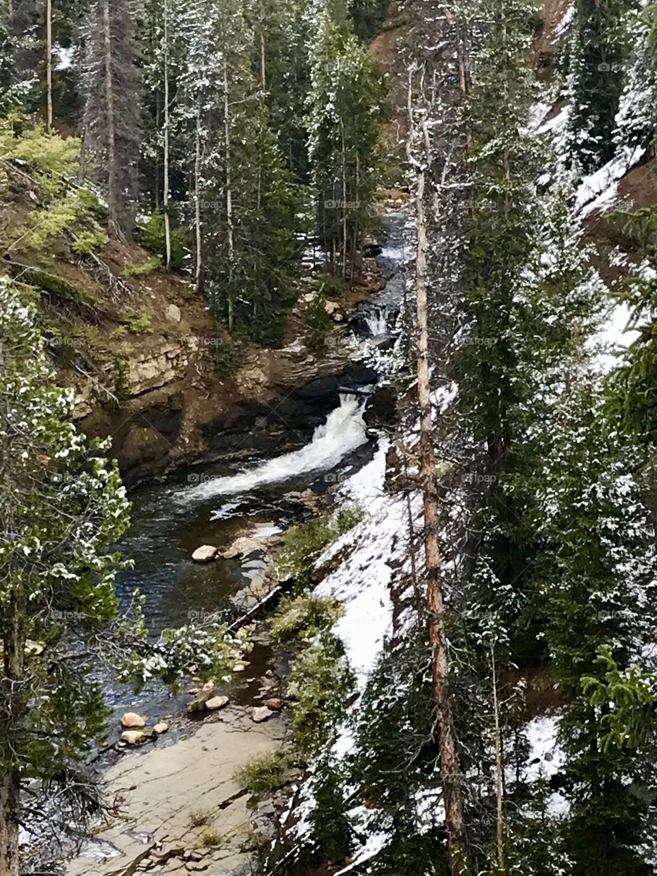 Waterfall with snow in the high Uinta Mountains, Utah