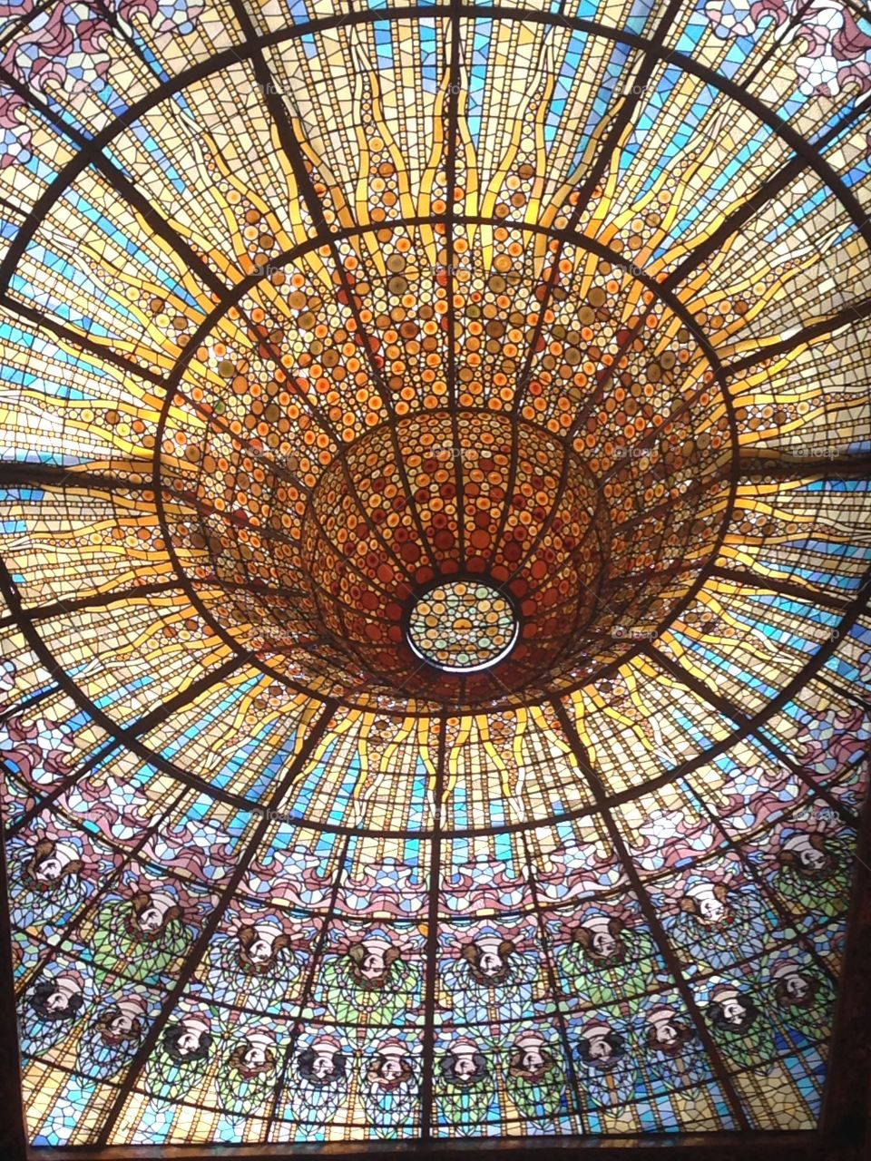 Barcelona  stained glass. Beautiful ceiling of Barcelona music hall. 