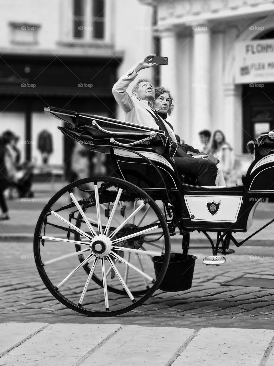 tourists in the cart immortalizing the moment