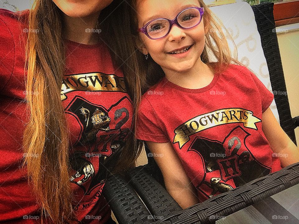 Me, my little sister and our matching HP shirts