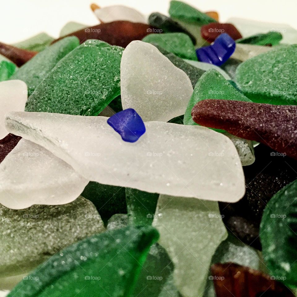 Pile of colorful sea glass, collecting sea glass from the Caribbean, trash to treasure, another man’s trash is my treasure, creating art with sea glass