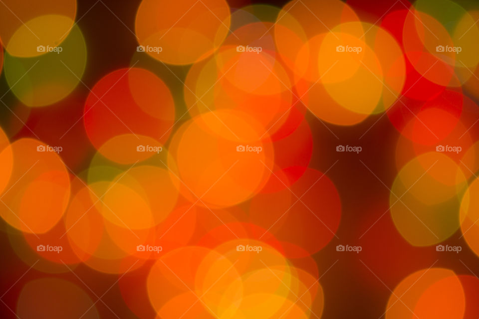 Blurring background for a holiday greeting card, banner advertising. Shimmering bokeh, lights of the city.