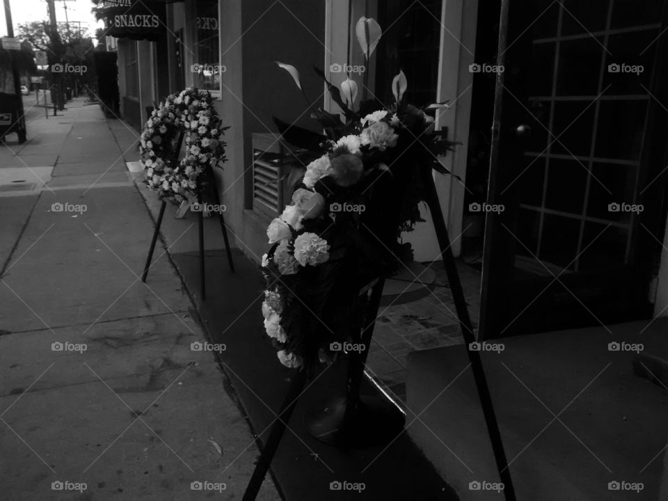 Wreaths in Front of a Shop