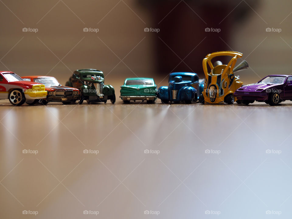 Colorful Diecast Vehicles Toys. Colorful set of diecast metal cars and vehicles with blurred background