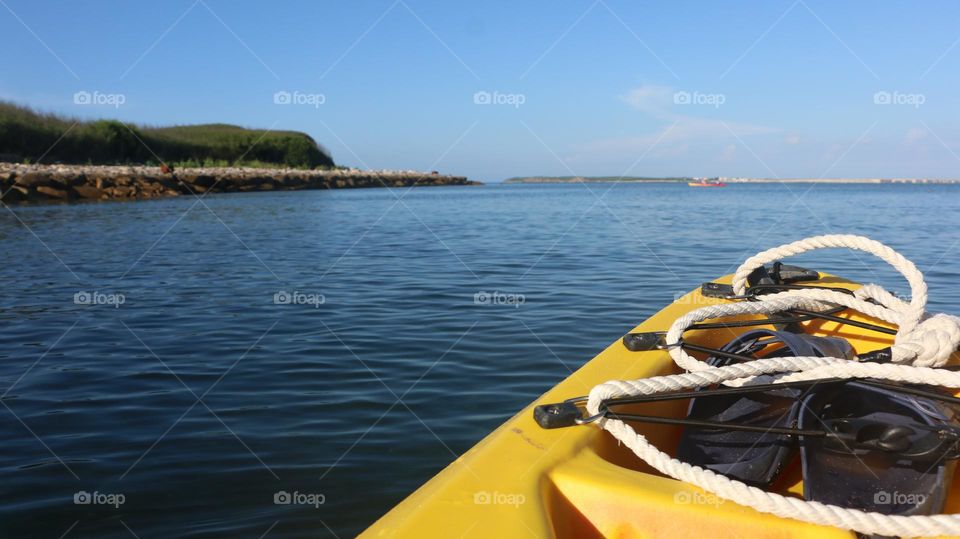 Photo with copy space - Rear view of kayak in sunset sea. Kayaking, Canoeing, Good weather, peace ocean.
