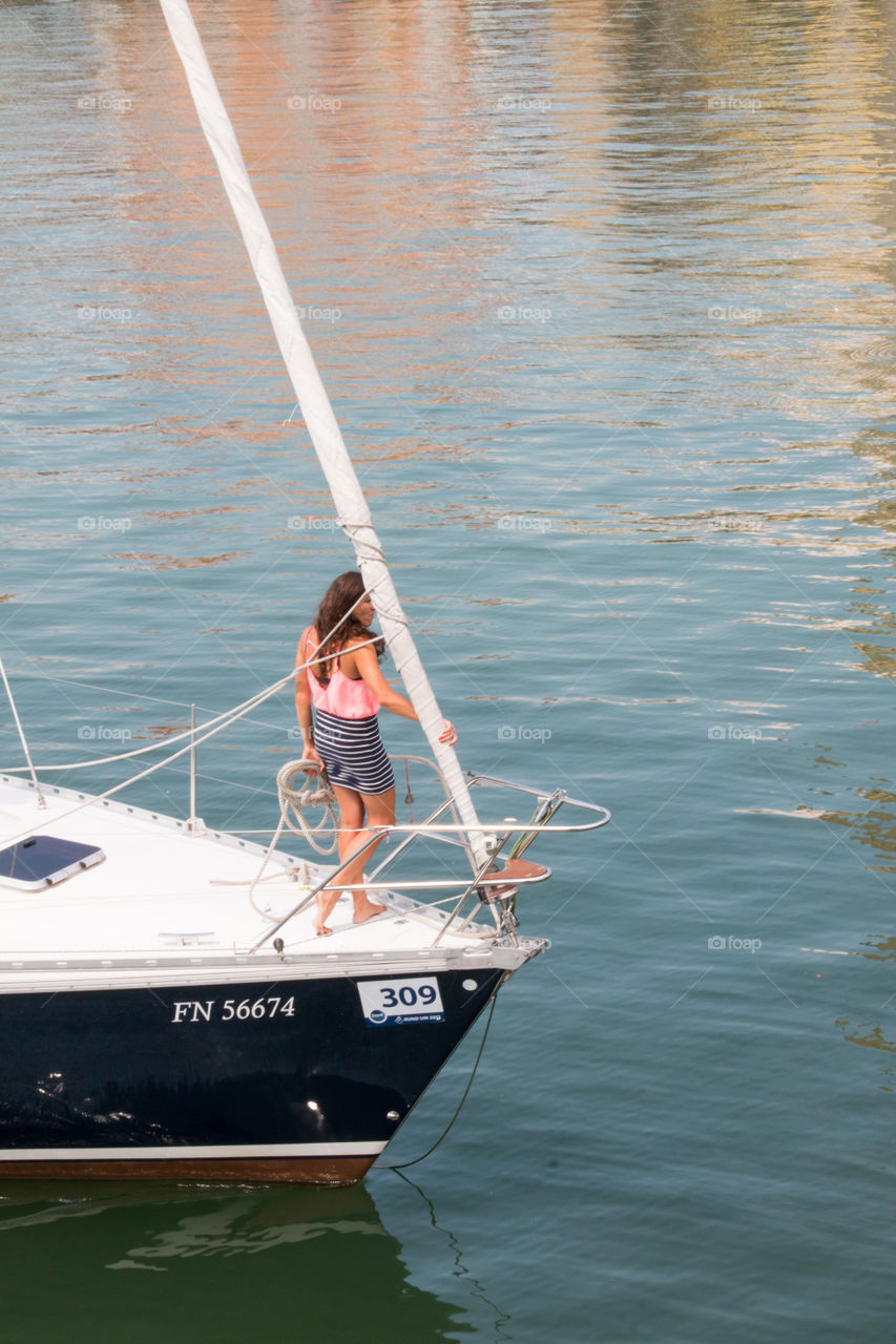 Woman on her sailboat 