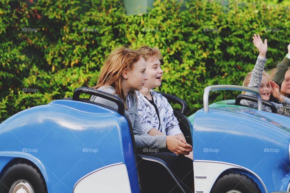 Teenagers on an amusement ride