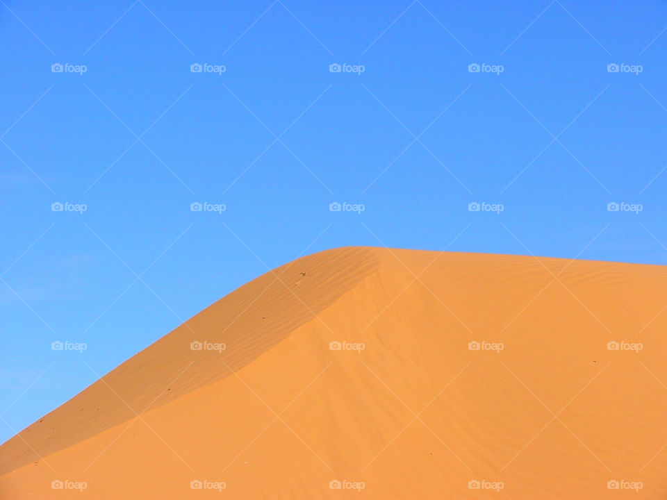 sky blue orange sand by kshapley