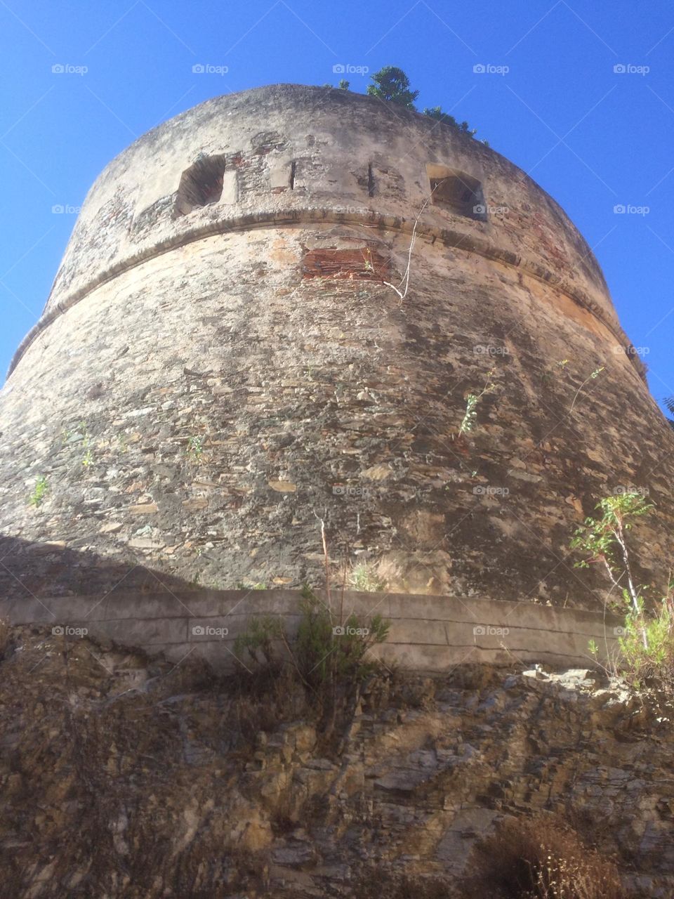 Old Genoese tower seen from the ground 