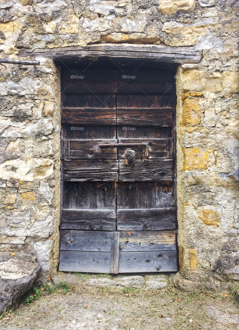 Old wooden doorway of a mountain rustic