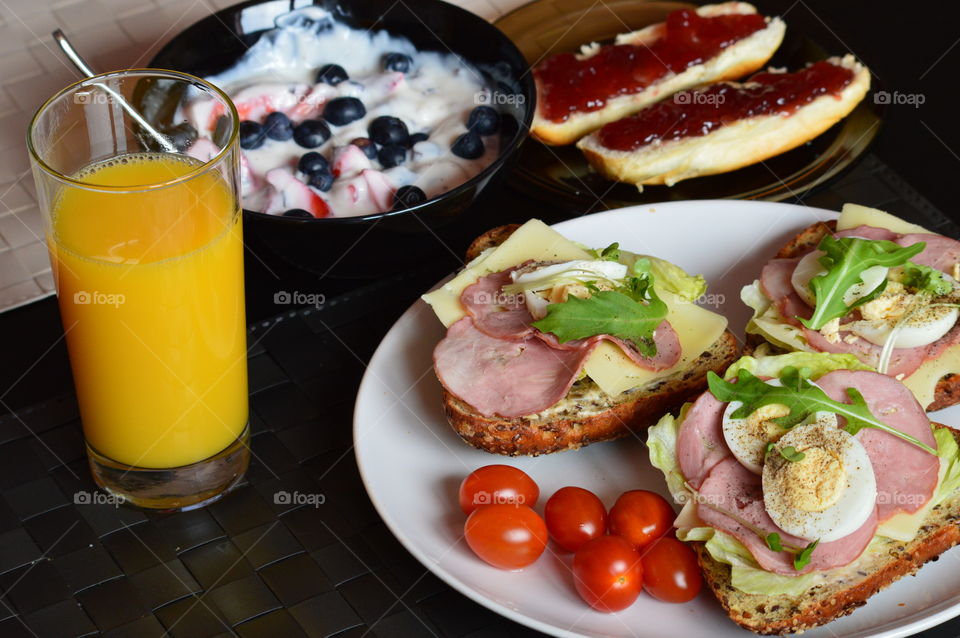 Healthy breakfast with juice on table