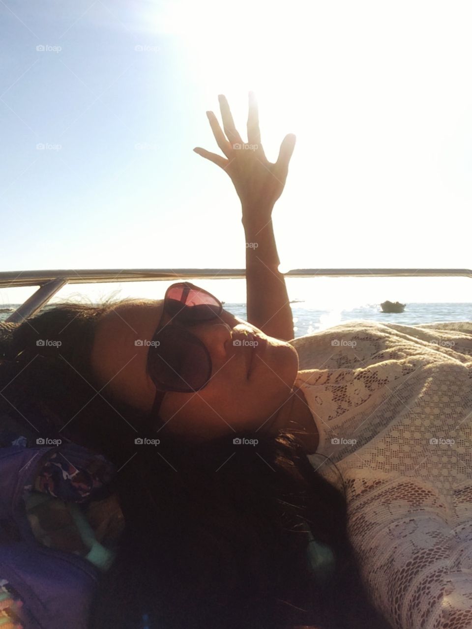 Enjoying sunlight at sea on boat