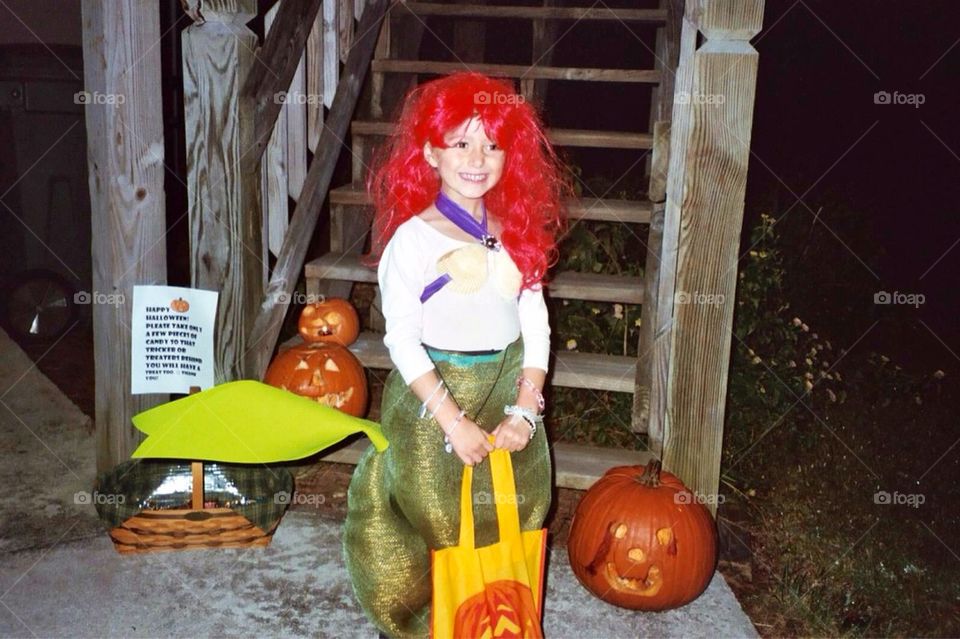 Little mermaid with pumpkins