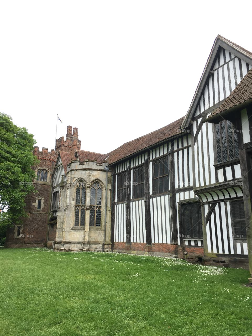 Exterior view of the brickwork and timber framing of the medieval Manor House at Gainsborough Old Hall