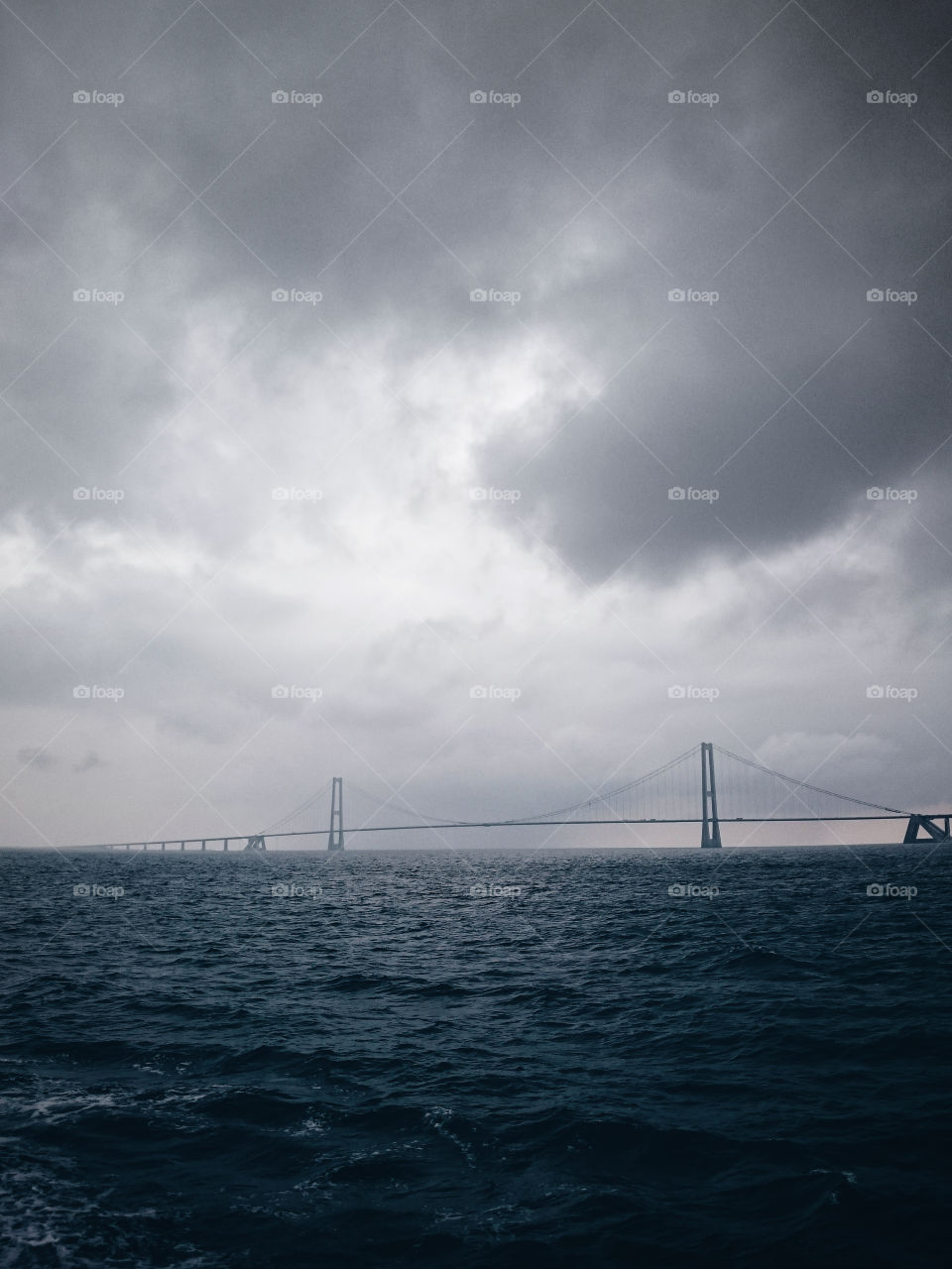 An endless Oresund Bridge on a cloudy day.