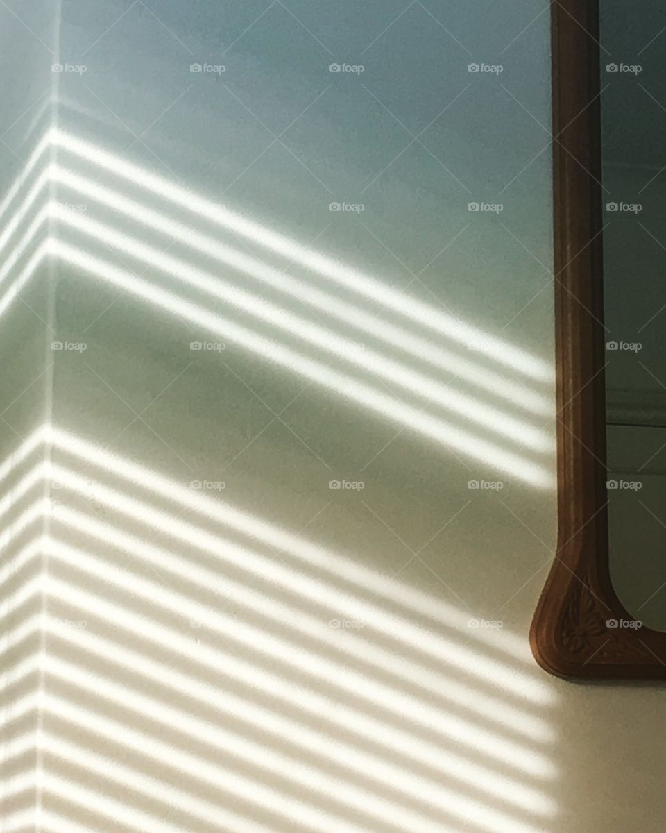 Sunlight through the blinds