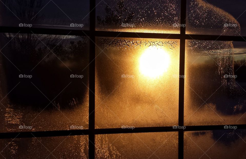 Sunrise Through Frosty Window