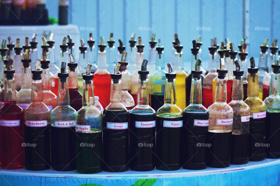 Flavorings for make-it-yourself sno-cones at a county fair