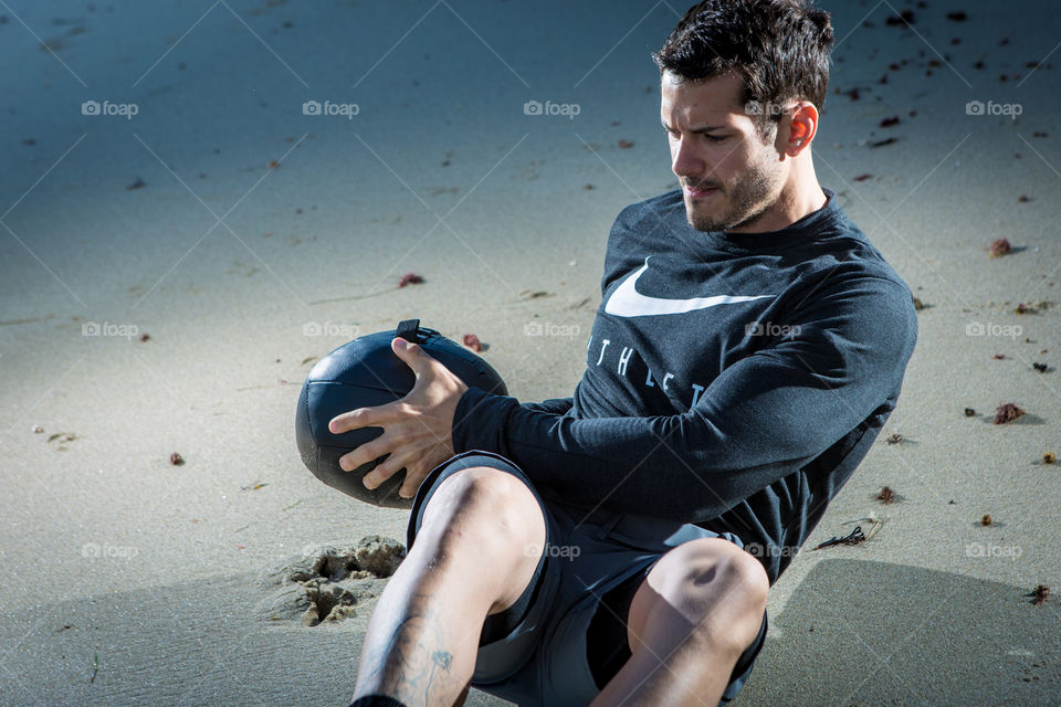 Medicine Ball Beach Workouts. 