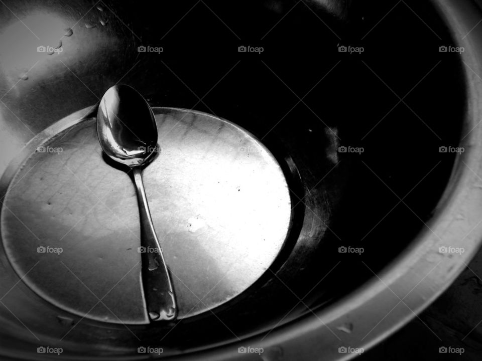 teaspoon in a metal silver bowl