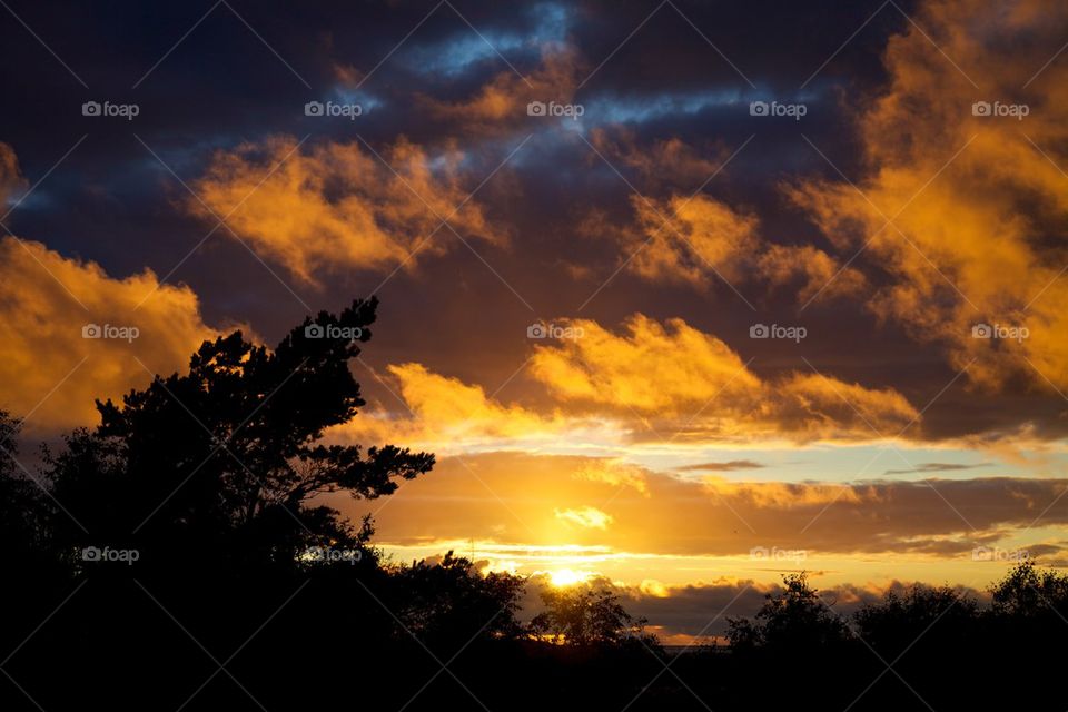 Scenic view of dramatic sky during sunset