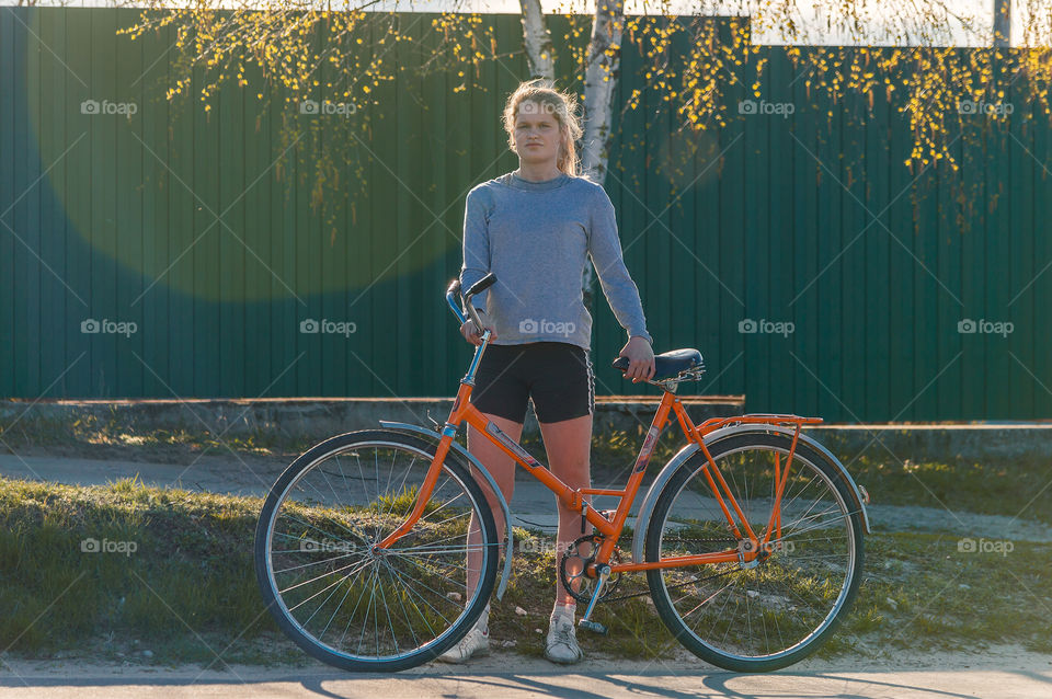 Girl is riding a bike