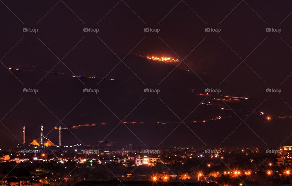 A Beautiful City

The Pakistani capital city of Islamabad at night.