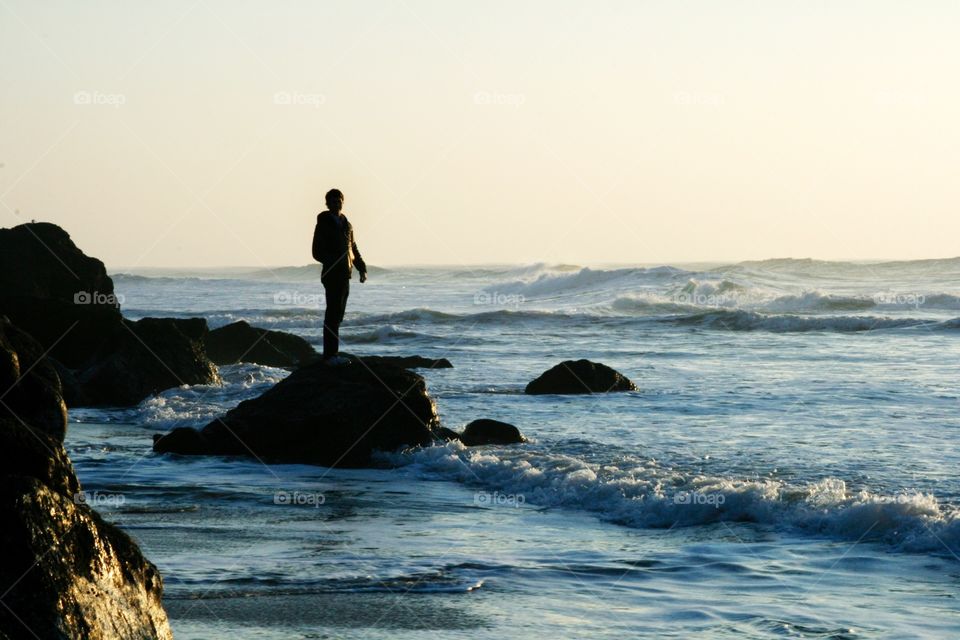 A person next to ocean 