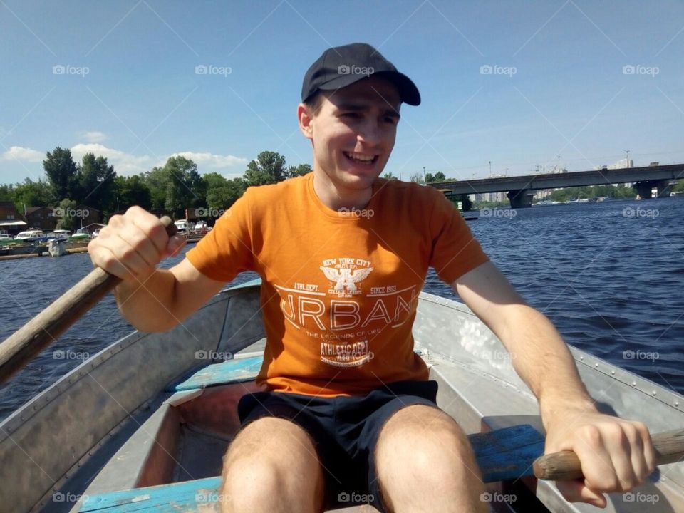 photo of the moment of enjoyment of boating on the river