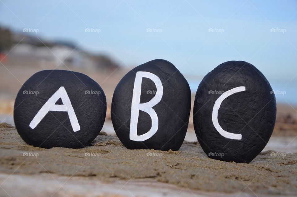 ABC on black stones