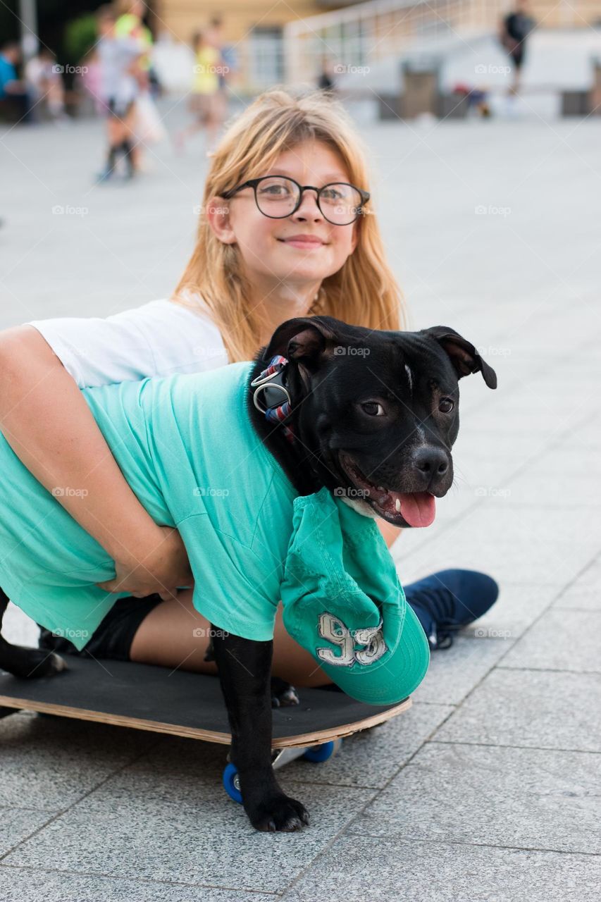 walking the dog, people walking the dogs on the street, they spend time together, the person plays with the dog, trains it, eat delicious food, take pictures. best friends are dogs. children and dogs for a walk