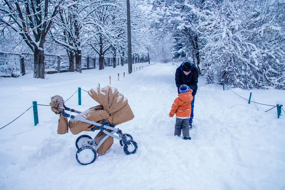 Dad and childrens in winter