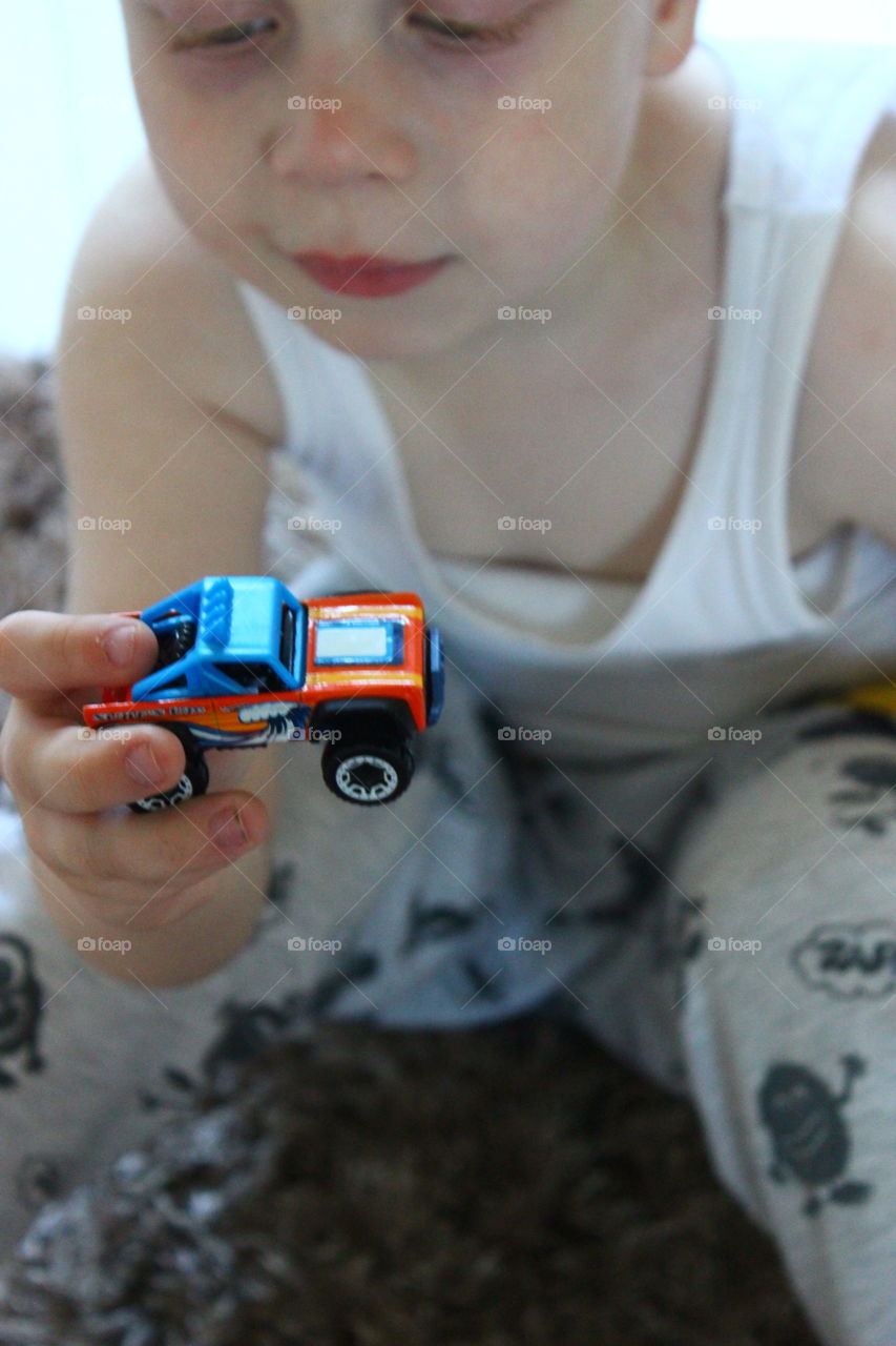toy car in hand