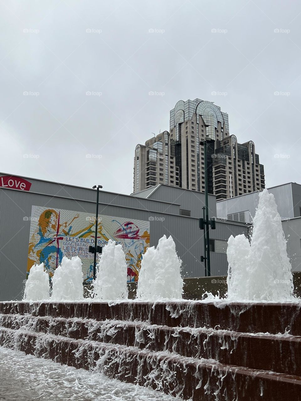 The fountains are shooting streams of water into the air.