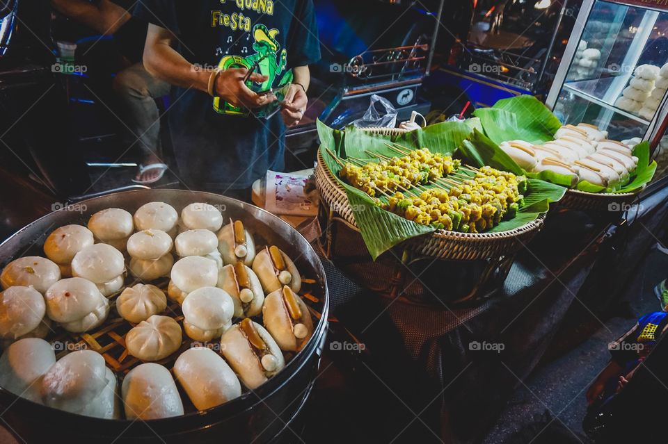 Steamed buns and dumplings at a Thai night market