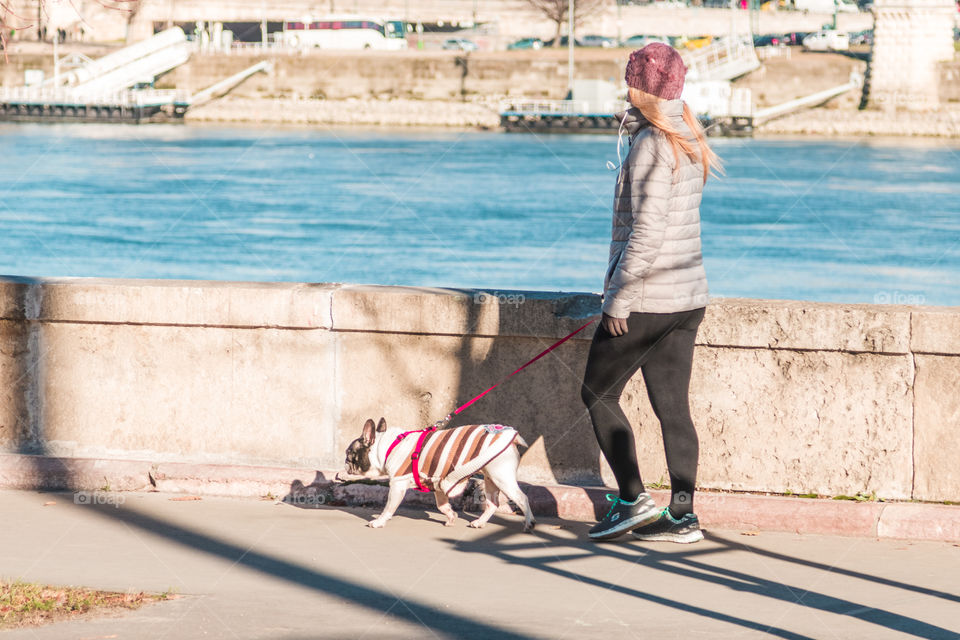 Young Girl With Her Dog Outside
