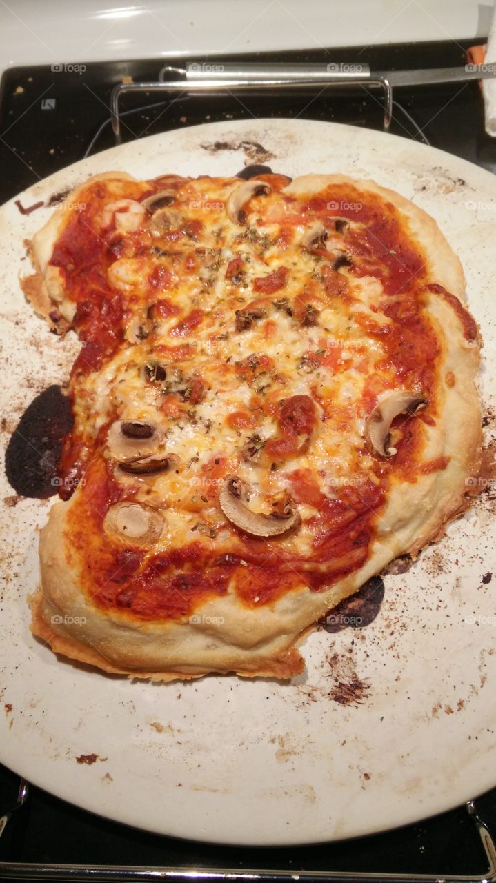 homemade pizza on new baptised stone mushroom and shrimp
