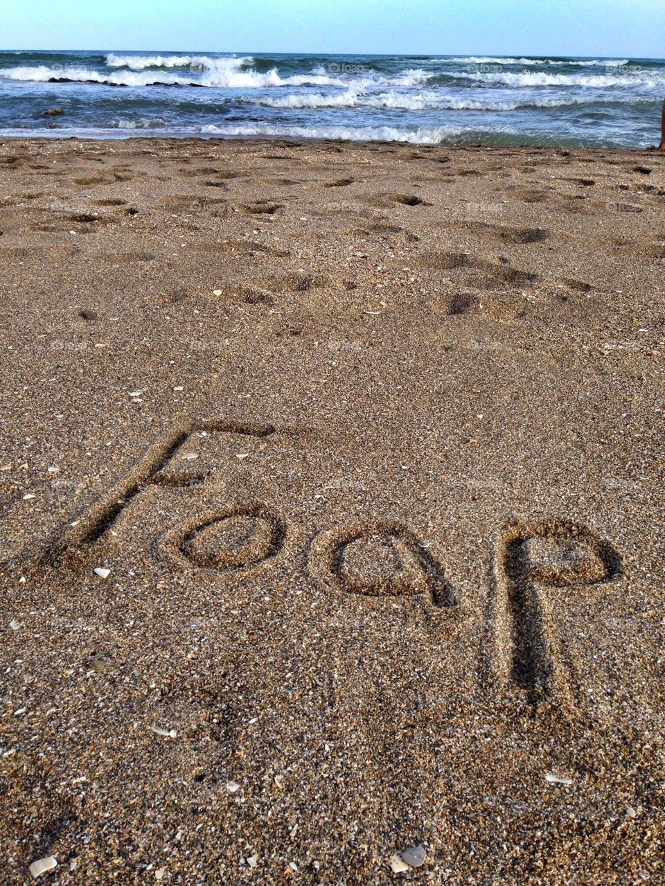 Foap written in the sand