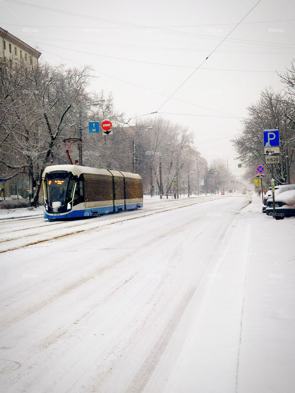 Winter has come.  Winter road and lonely tram