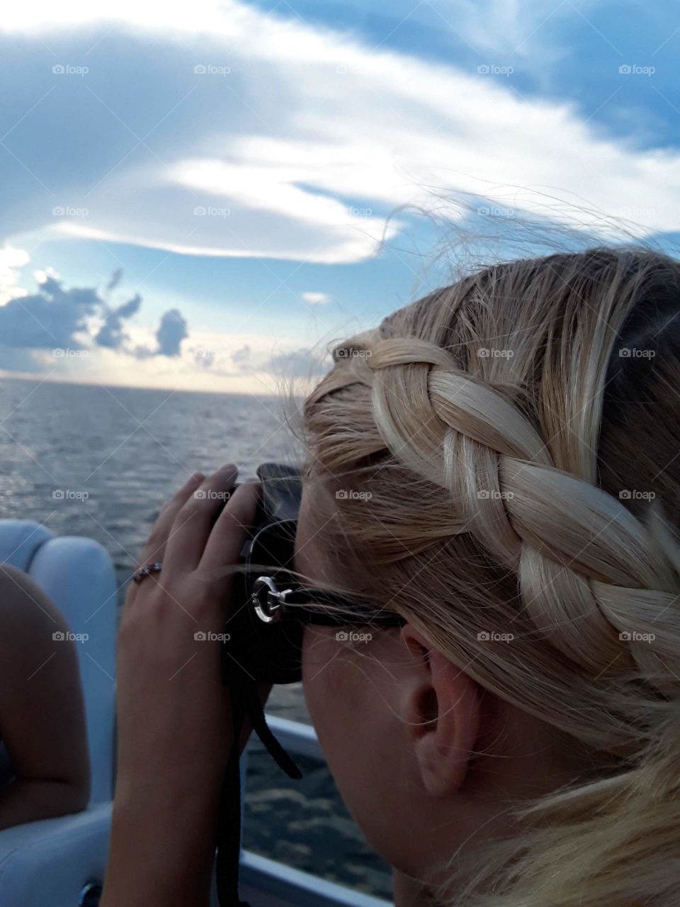 Ocean view with my sister taking photos of it. Taken in Virginia Beach, Virginia.